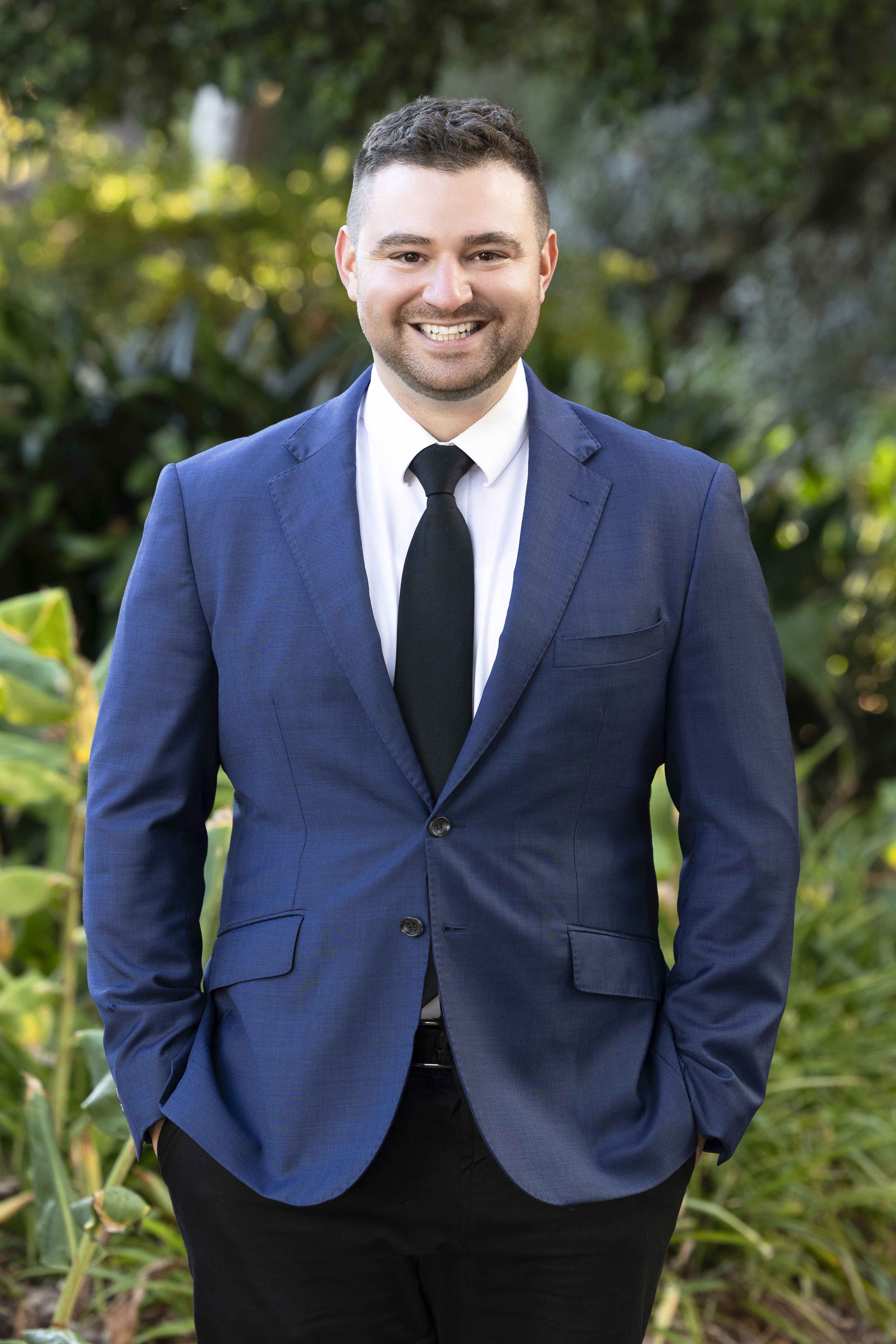 Luke Fornieri speaking with clients